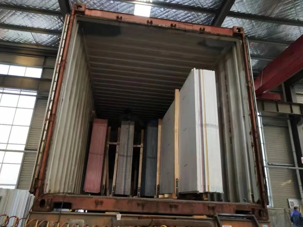 Loading marble and granite into a container